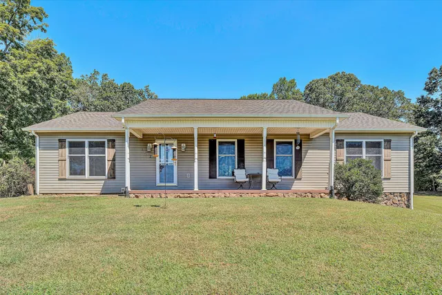 front view of a house with a patio