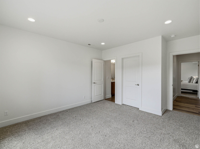 402 Shadow Hill Road Wanship, UT 84017 - Photo 59 of 90 Unfurnished bedroom with carpet floors and recessed lighting