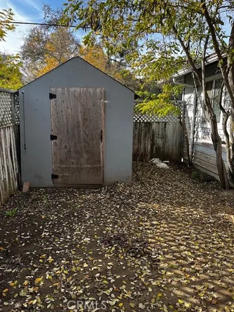 a kitchen with a sink and a refrigerator