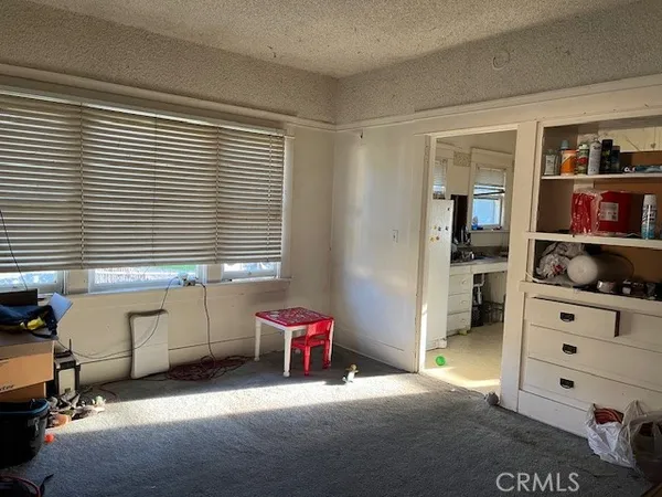 a room with furniture and window