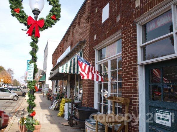 314 Sadie Drive Matthews, NC 28105 - Photo 7 of 13 a front view of a building with street