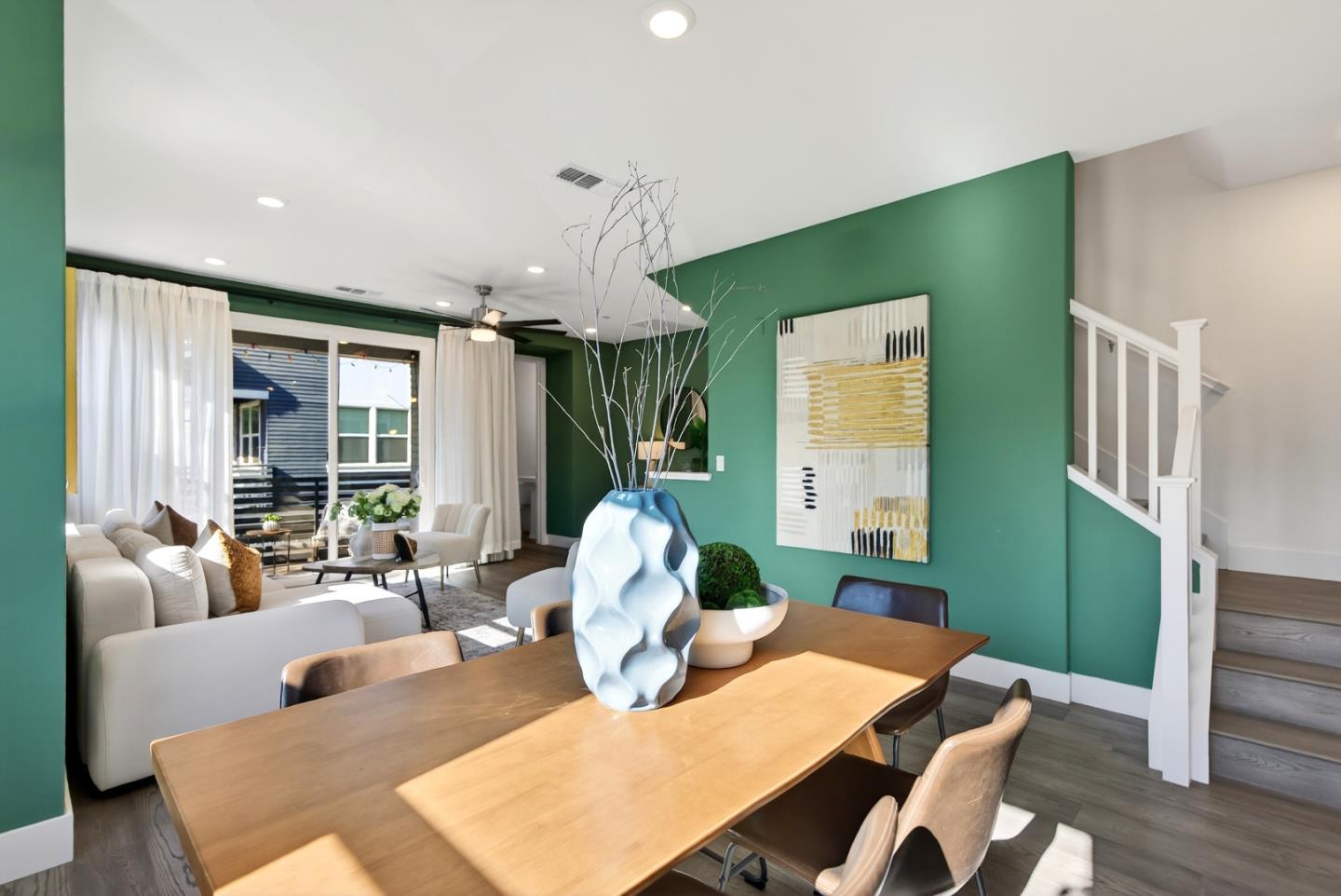 2268 Mora Place Mountain View, CA 94040 - Photo 14 of 38 a living room with furniture dining table and a large window