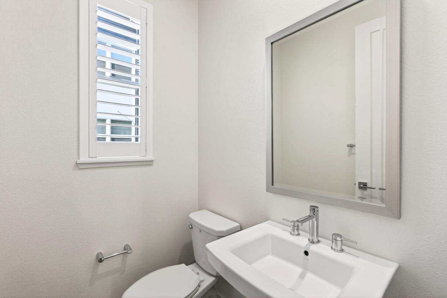 2268 Mora Place Mountain View, CA 94040 - Photo 20 of 38 a bathroom with a sink toilet and mirror