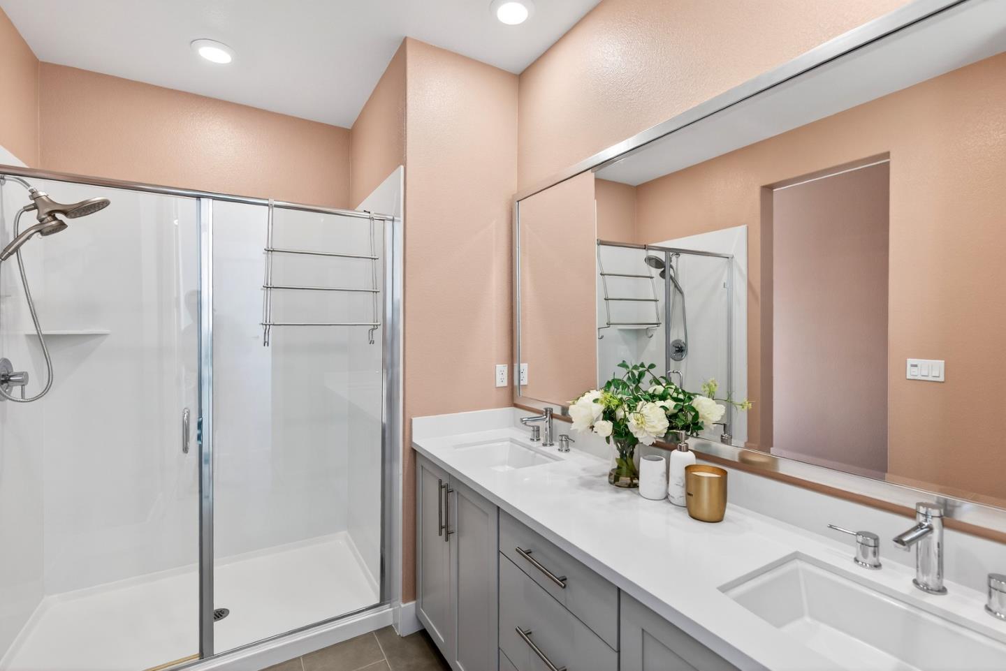 2268 Mora Place Mountain View, CA 94040 - Photo 24 of 38 a bathroom with a granite countertop sink a mirror and a shower