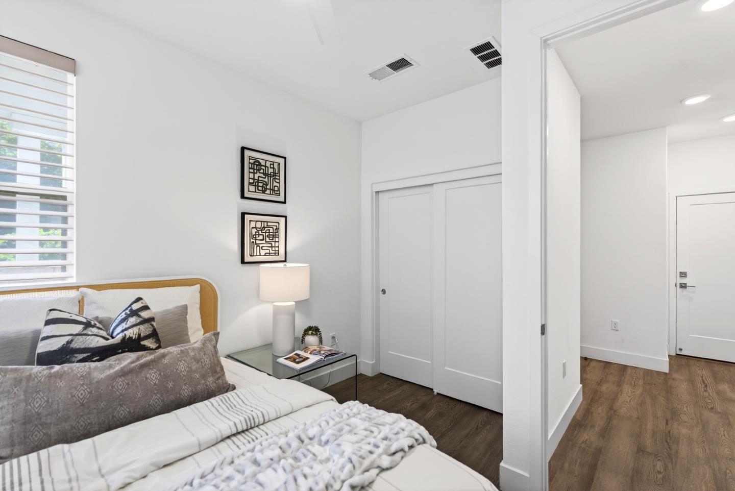 2268 Mora Place Mountain View, CA 94040 - Photo 5 of 38 a bedroom with a bed and wooden floor