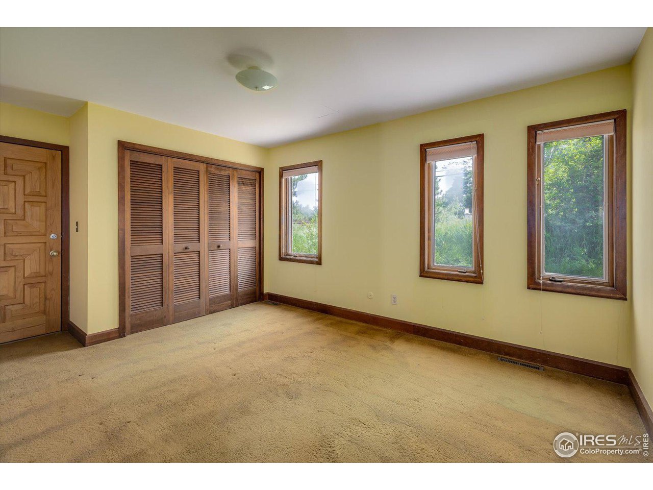 400 Ord Drive Boulder, CO 80303 - Photo 29 of 39 3rd bedroom w/ door to exterior