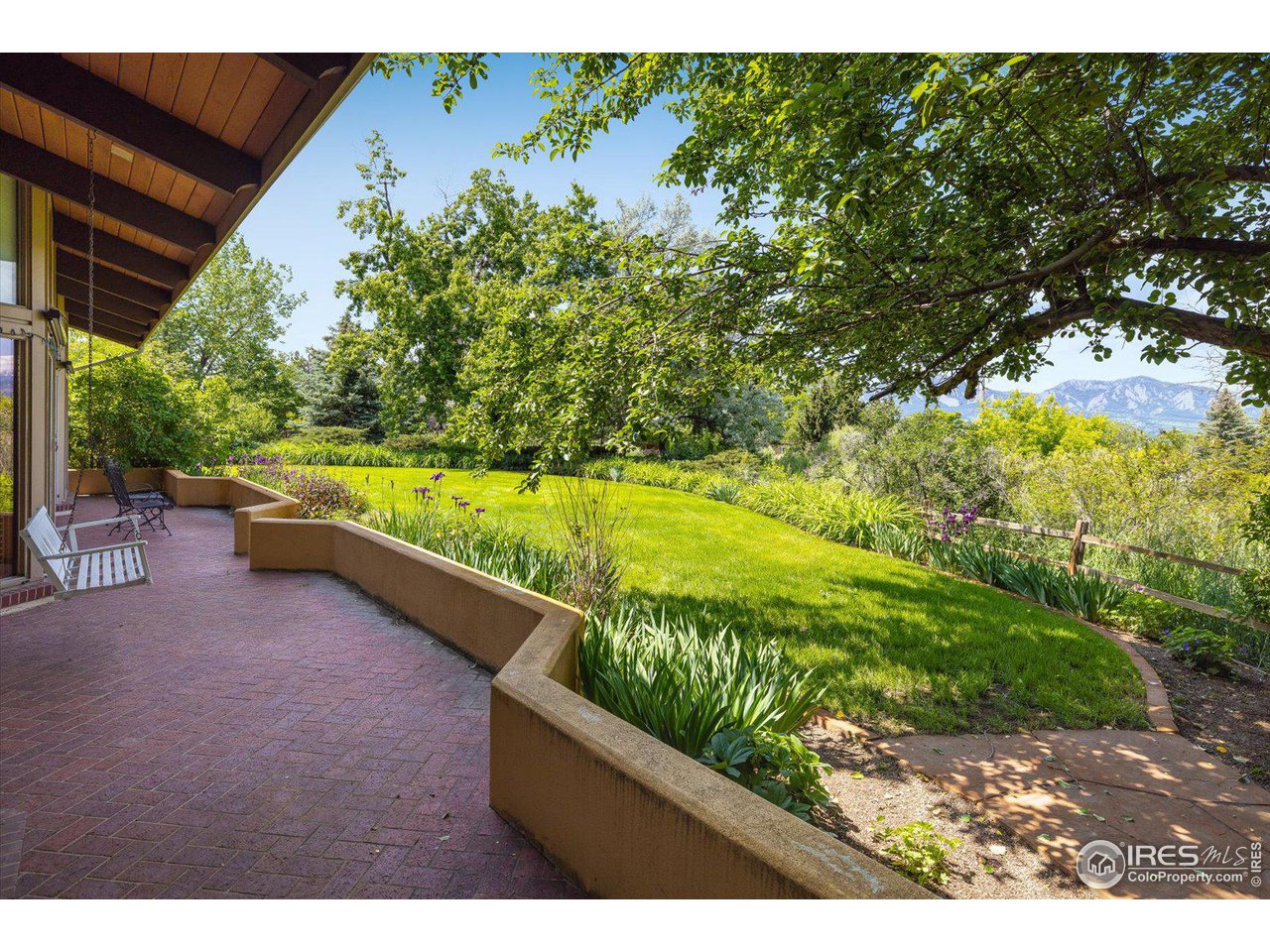 400 Ord Drive Boulder, CO 80303 - Photo 33 of 39 Expansive front porch w/ flowers all around!