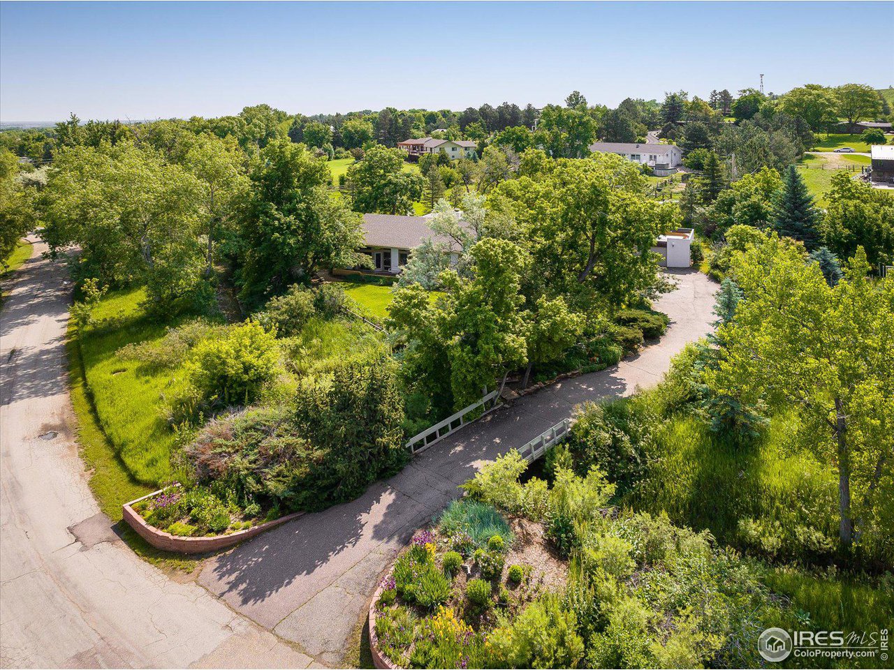 400 Ord Drive Boulder, CO 80303 - Photo 4 of 39 Private setting! Cross over the bridge to this spectacular property