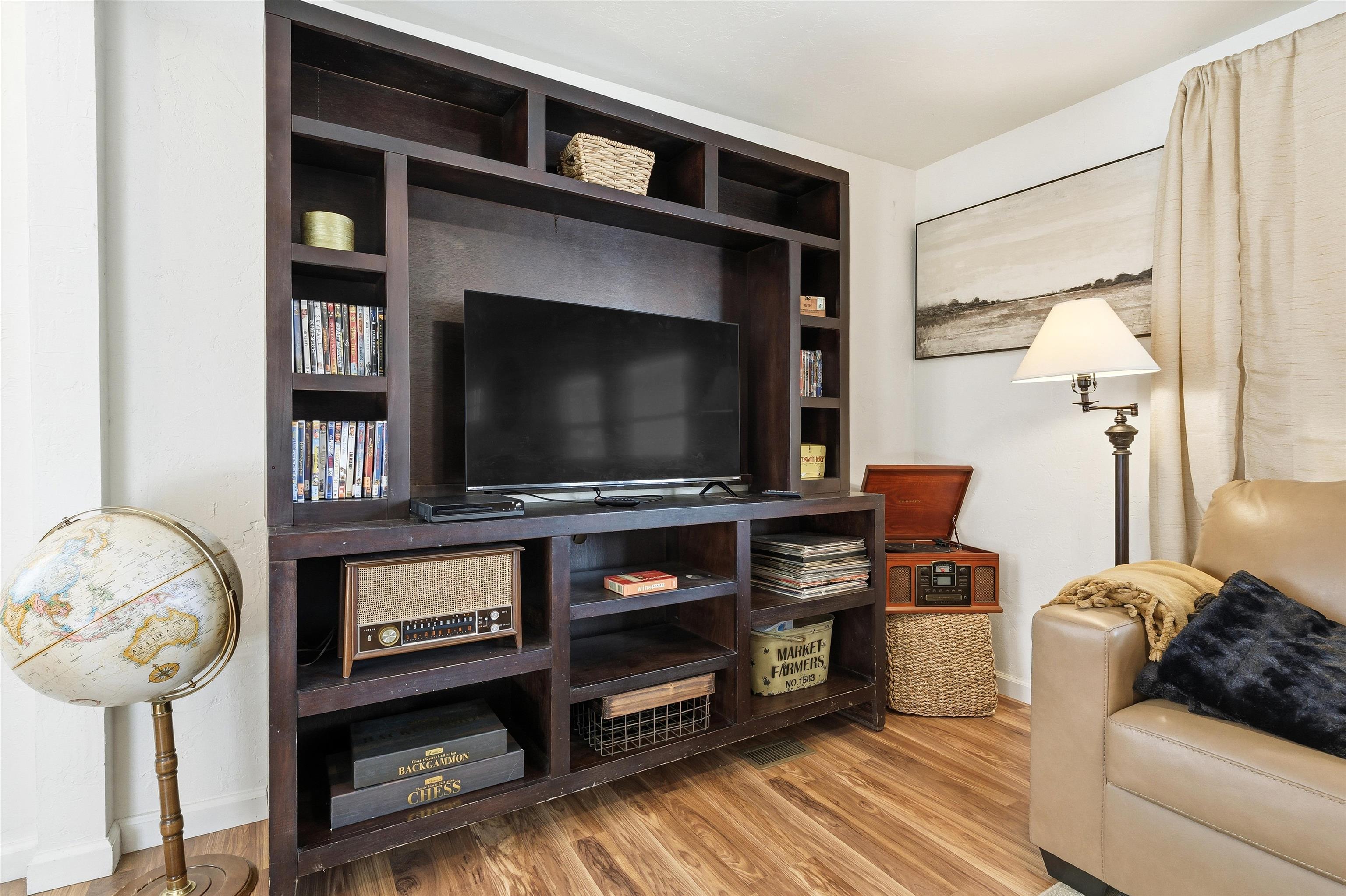702-37 37 1/10 Road Palisade, CO 81526 - Photo 11 of 42 a living room with furniture and a flat screen tv