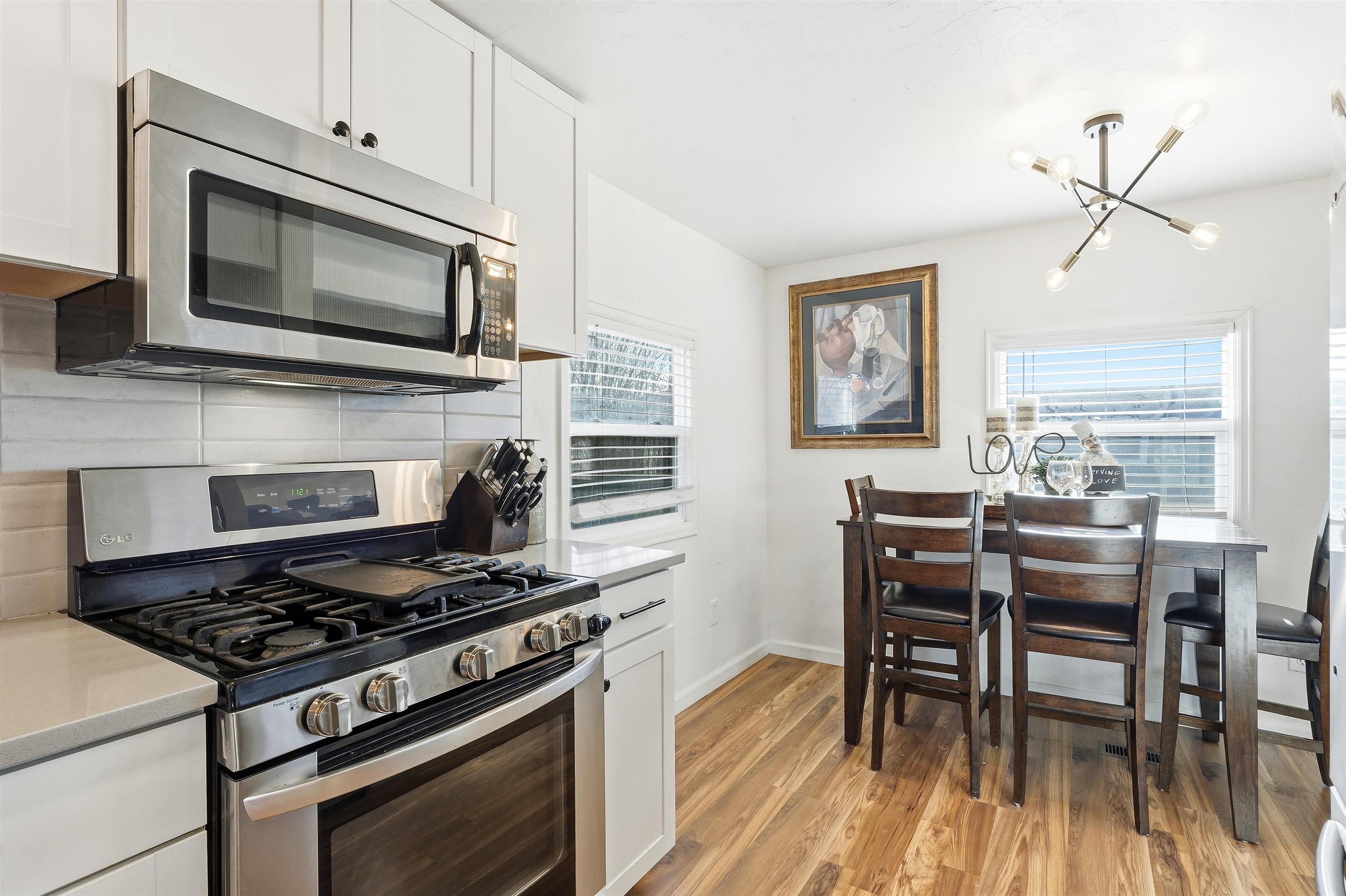 702-37 37 1/10 Road Palisade, CO 81526 - Photo 16 of 42 a kitchen with a stove and a microwave