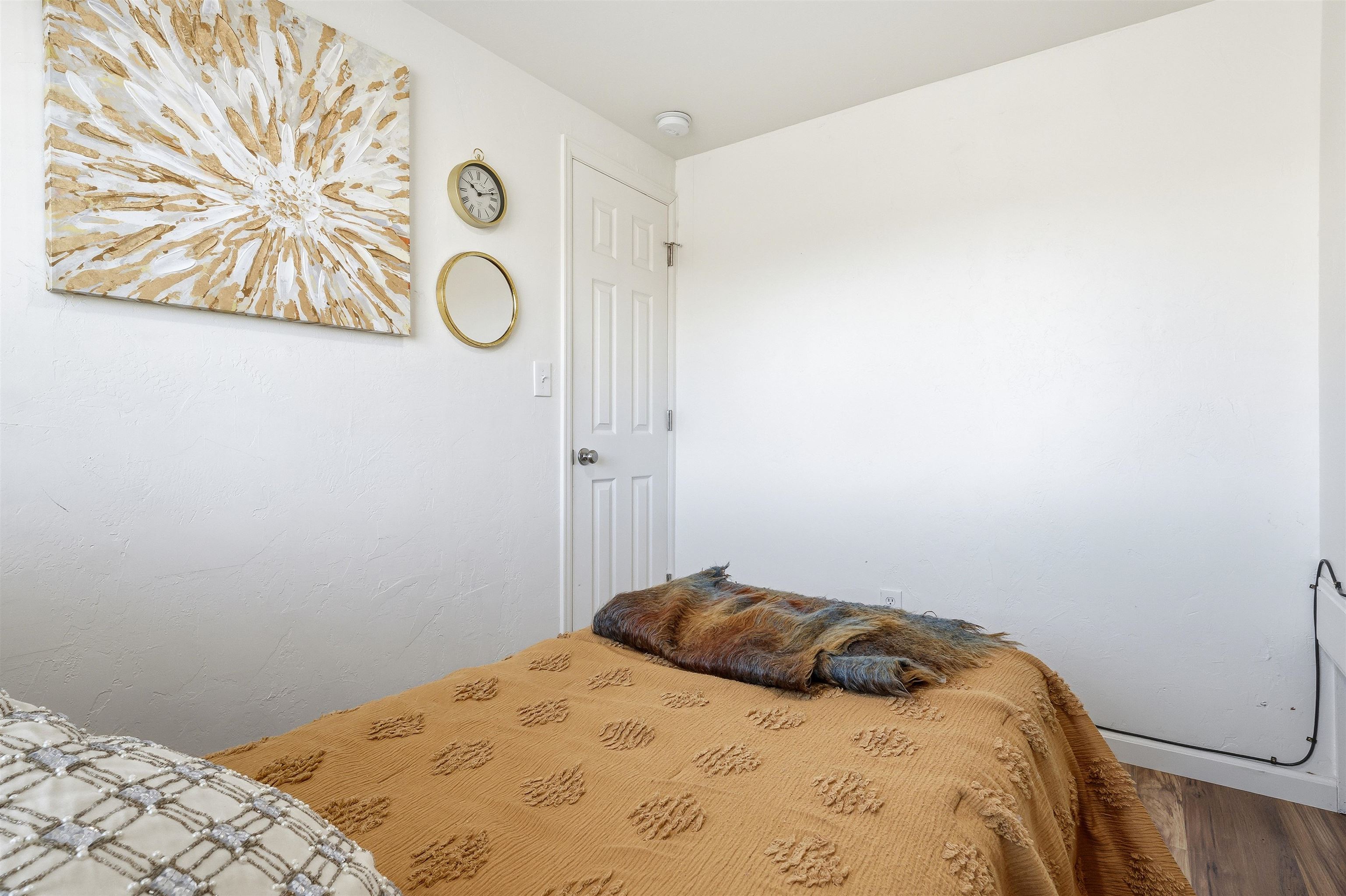 702-37 37 1/10 Road Palisade, CO 81526 - Photo 24 of 42 a bedroom with a bed and cabinets