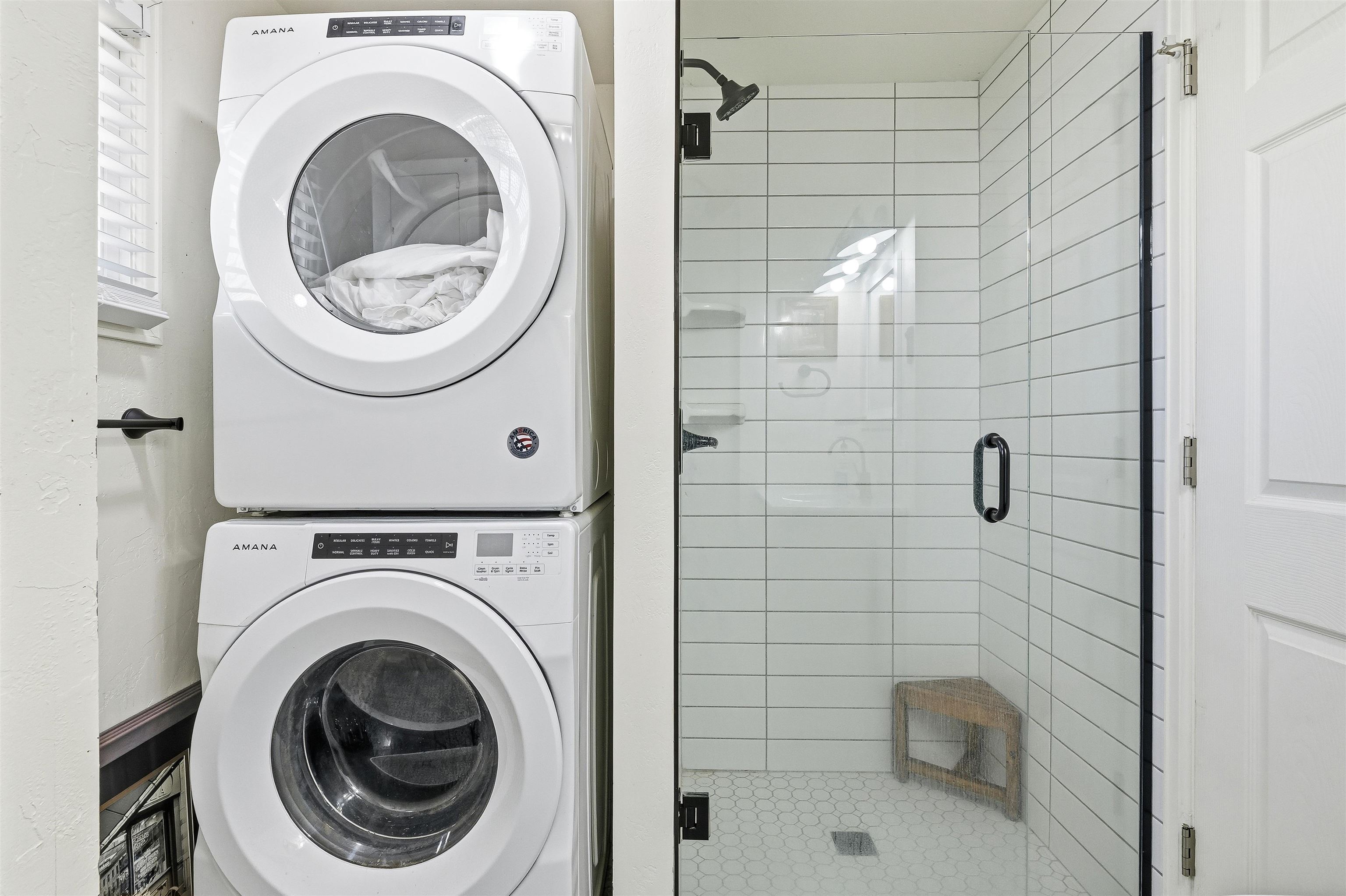 702-37 37 1/10 Road Palisade, CO 81526 - Photo 30 of 42 a view of a bathroom with a washer and dryer