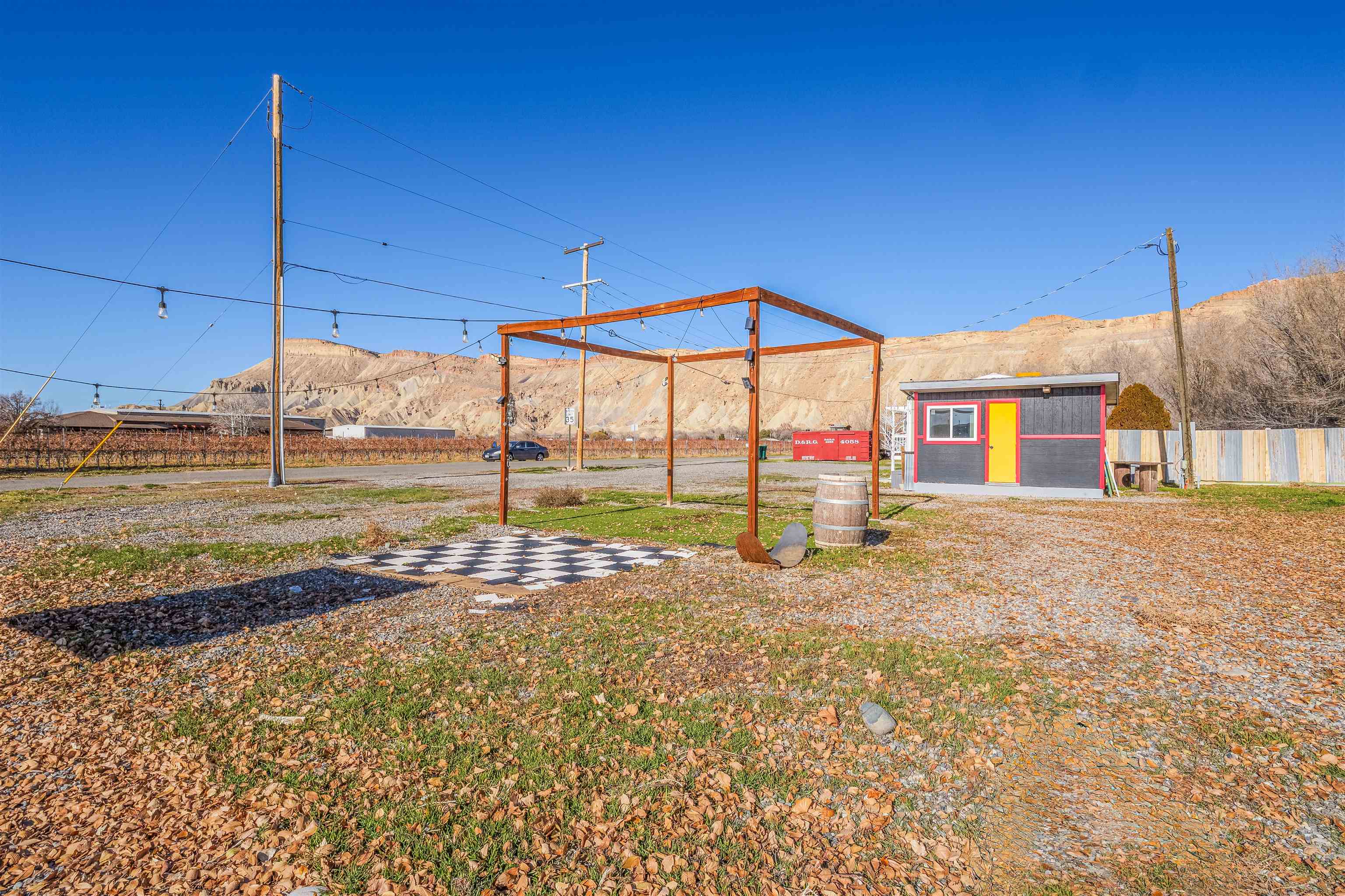 702-37 37 1/10 Road Palisade, CO 81526 - Photo 38 of 42 a view of a house with a yard