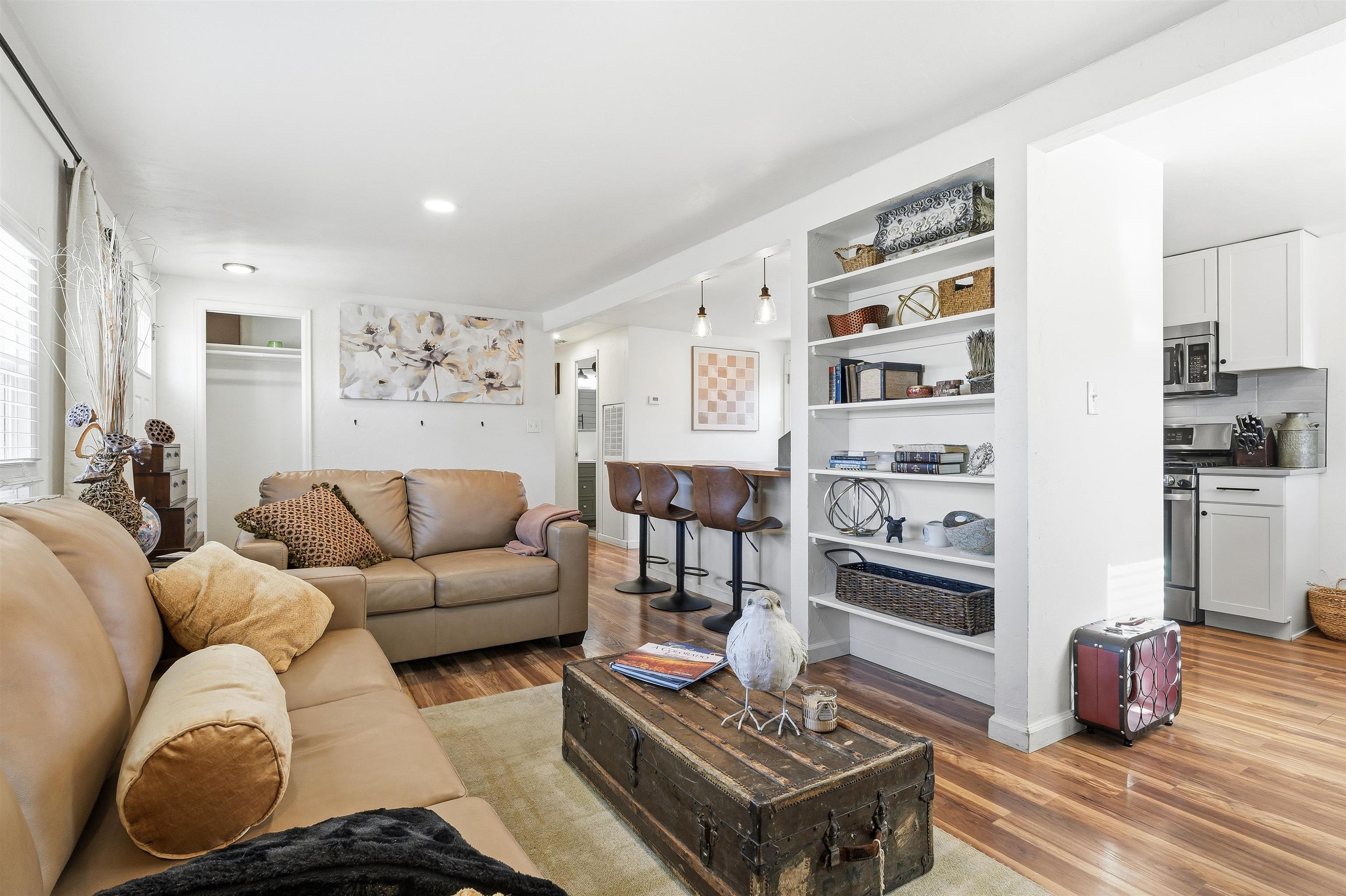702-37 37 1/10 Road Palisade, CO 81526 - Photo 10 of 42 a living room with furniture and a rug