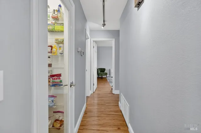 a bathroom with a sink and vanity