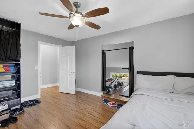 a bathroom with a toilet a sink and a mirror