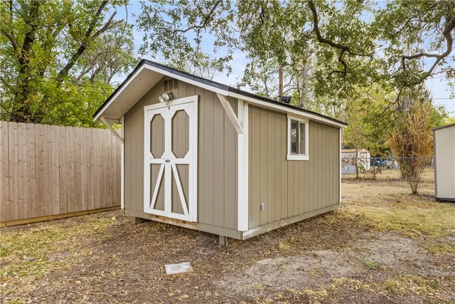 a view of backyard of house