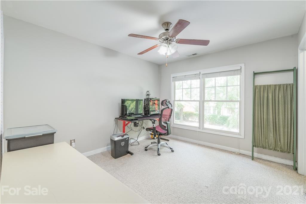 1131 Market Street Fort Mill, SC 29708 - Photo 14 of 27 a view of a workspace with furniture and a window