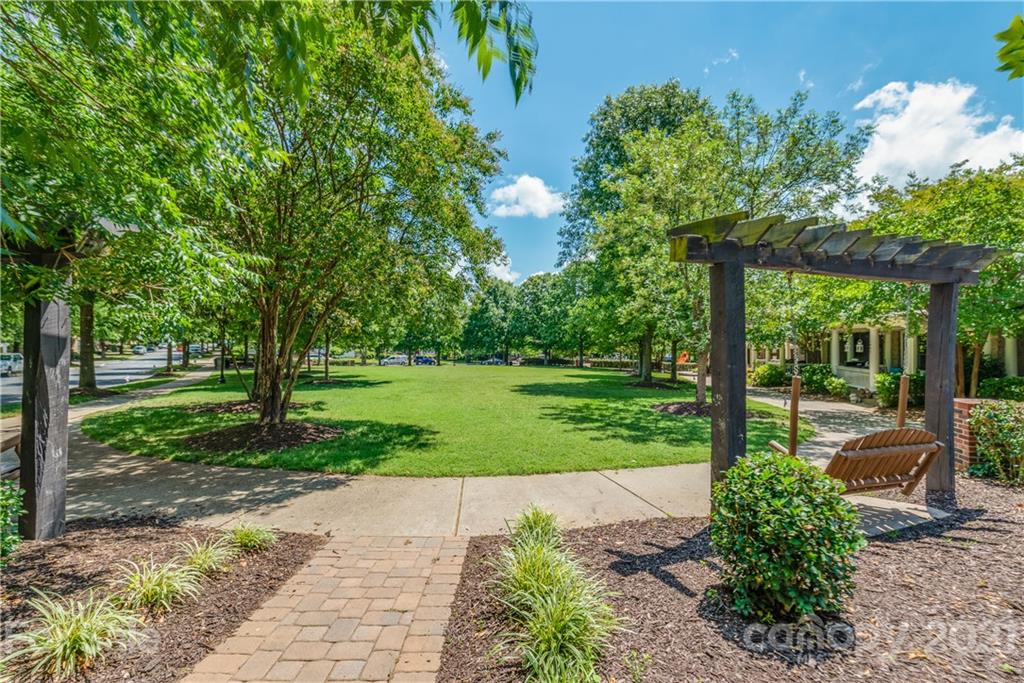 1131 Market Street Fort Mill, SC 29708 - Photo 20 of 27 a view of a garden with large trees