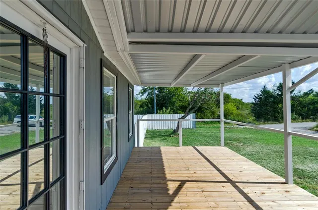 a view of backyard with mountain view and a garden