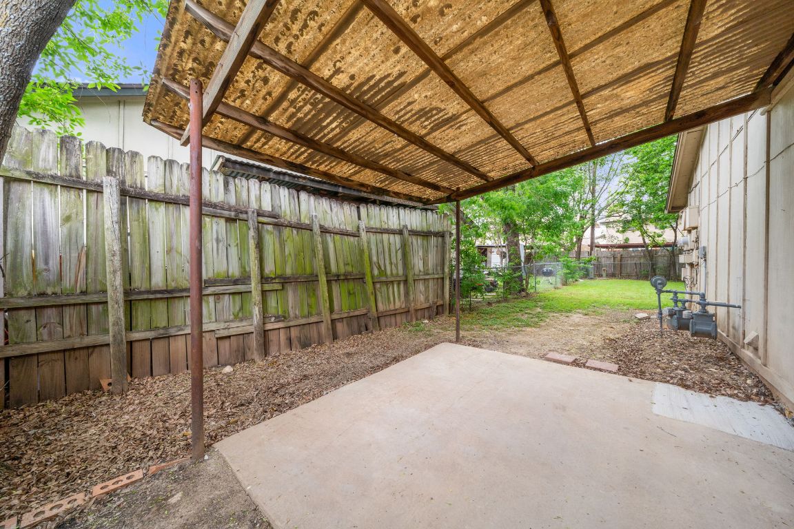 100 Meteor Drive, Unit B Austin, TX 78745 - Photo 24 of 29 Fenced backyard featuring a patio area