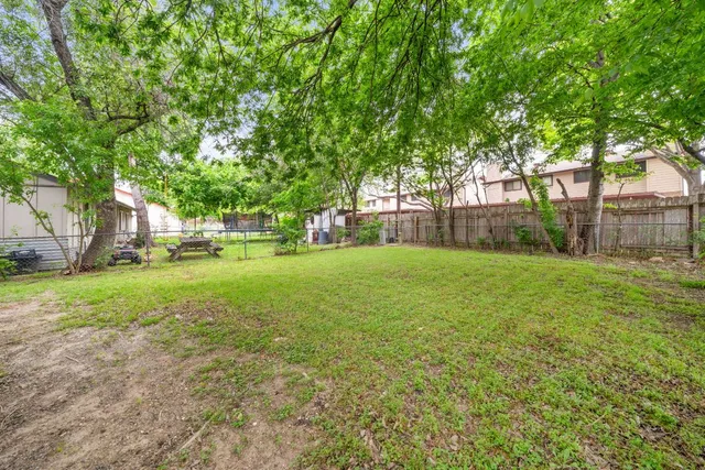 a house view with a garden space