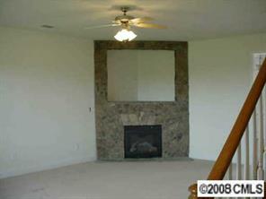 5402-1 Griffith Road Monroe, NC 28112 - Photo 3 of 8 a view of a livingroom with a fireplace