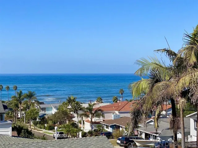 a view of a city and ocean view