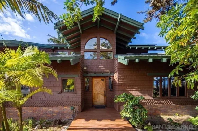 a view of a house with a street