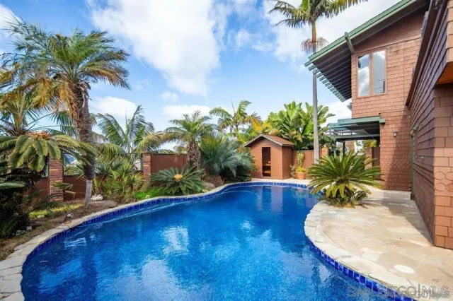 front view of a house with a street