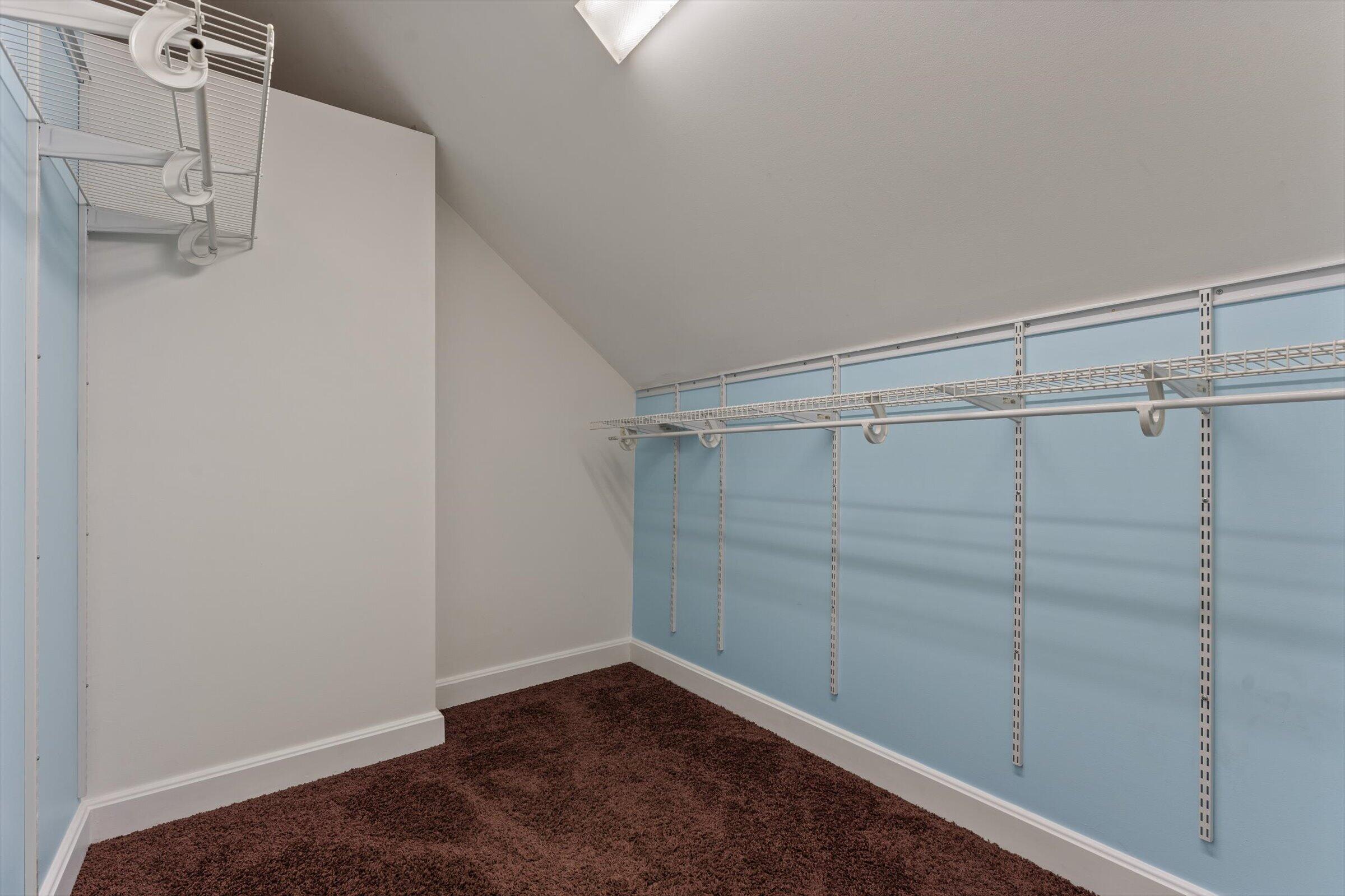 7692 North Emery Road Rolling Prairie, IN 46371 - Photo 51 of 69 a view of a room with racks on the wall