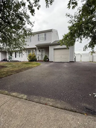 front view of a house with a street
