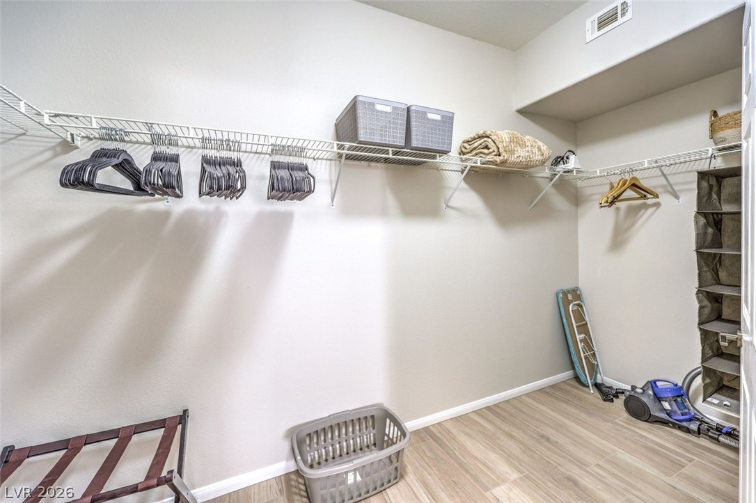 855 North Stephanie Street, Unit 1015 Henderson, NV 89014 - Photo 18 of 27 Primary bedroom walk in closet