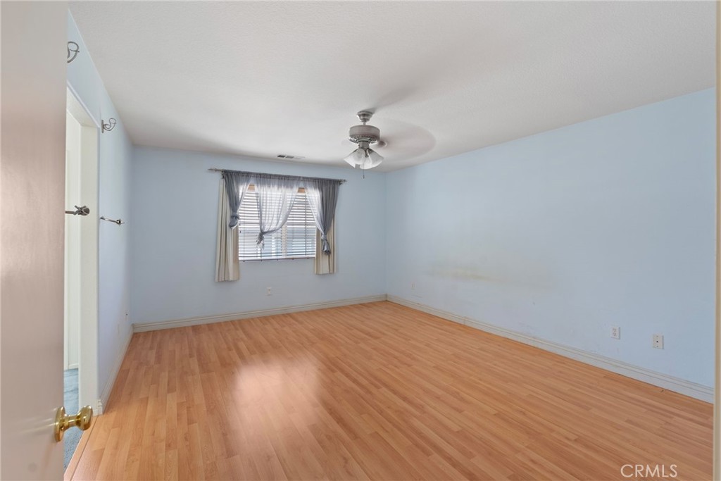 17887 Lilac Court Carson, CA 90746 - Photo 23 of 48 wooden floor in an empty room with a window