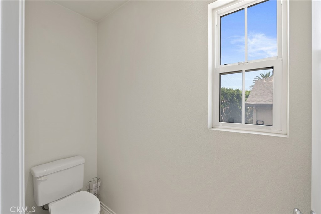 17887 Lilac Court Carson, CA 90746 - Photo 29 of 48 a white toilet sitting next to a bathroom sink