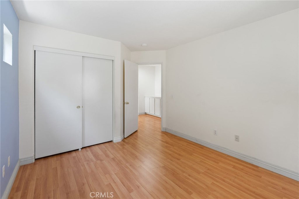 17887 Lilac Court Carson, CA 90746 - Photo 34 of 48 a view of an empty room with wooden floor