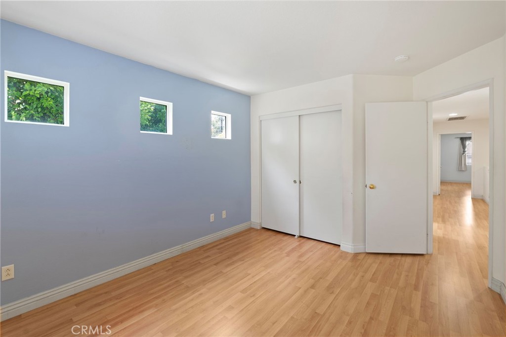 17887 Lilac Court Carson, CA 90746 - Photo 35 of 48 a view of an empty room with wooden floor