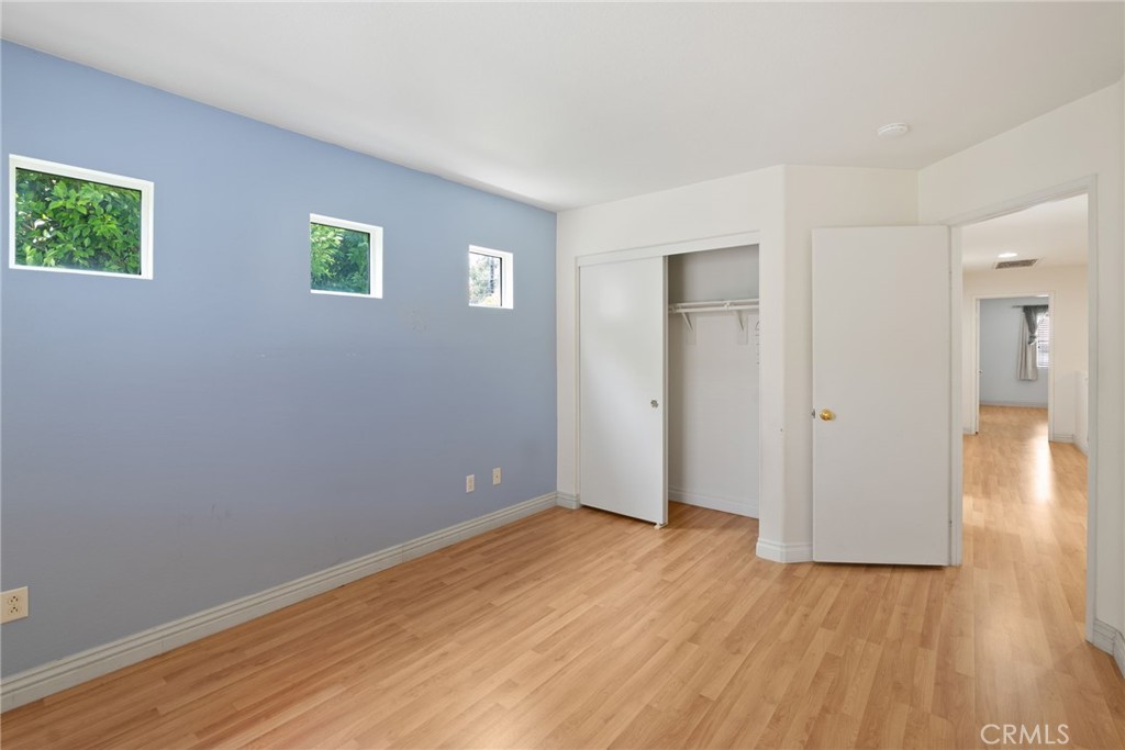 17887 Lilac Court Carson, CA 90746 - Photo 36 of 48 a view of an empty room with wooden floor