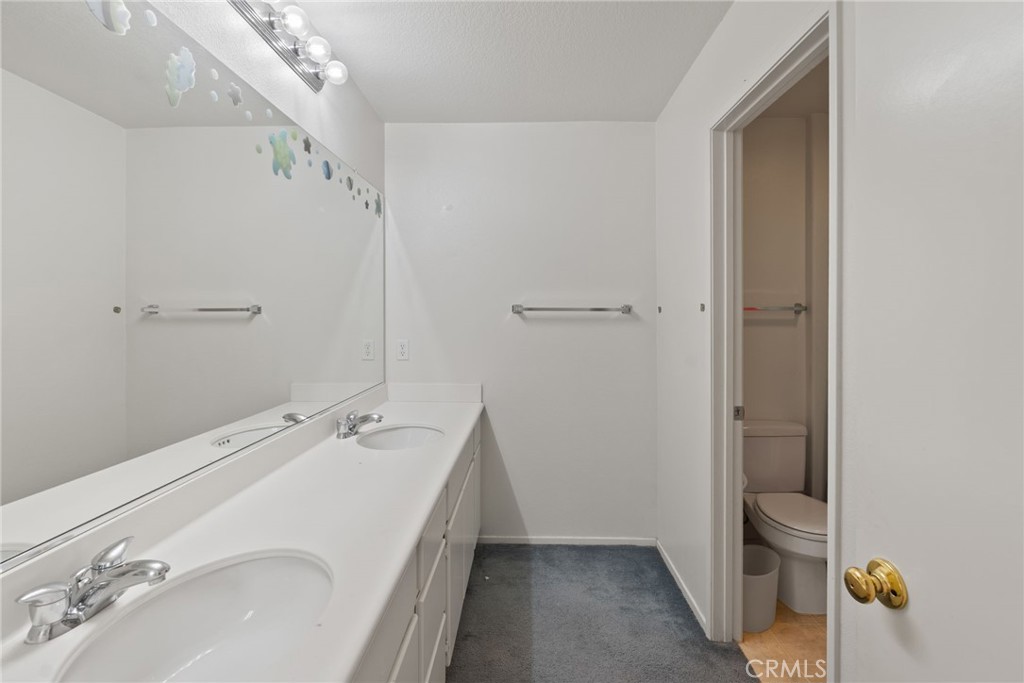 17887 Lilac Court Carson, CA 90746 - Photo 38 of 48 a bathroom with a sink and shower