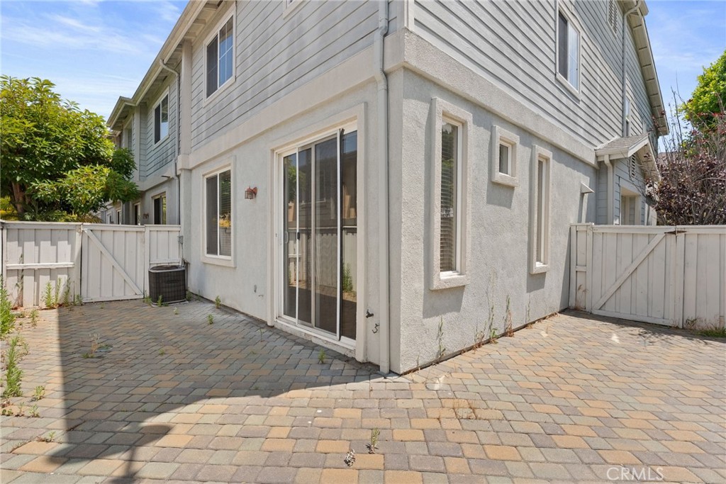 17887 Lilac Court Carson, CA 90746 - Photo 5 of 48 a view of a house with a wooden fence