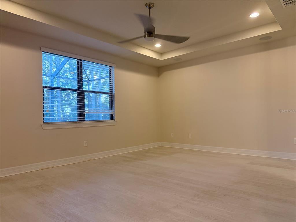 10041 Southwest 77th Loop Ocala, FL 34481 - Photo 16 of 39 a view of an empty room with a window