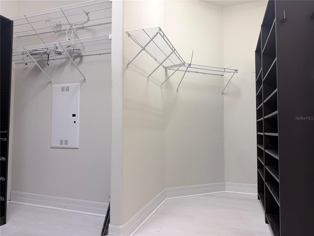 10041 Southwest 77th Loop Ocala, FL 34481 - Photo 23 of 39 a view of a room with racks on the wall