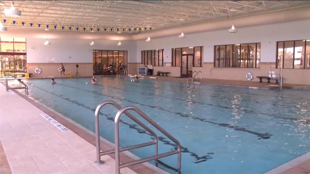 10041 Southwest 77th Loop Ocala, FL 34481 - Photo 30 of 39 a view of a room with gym equipment