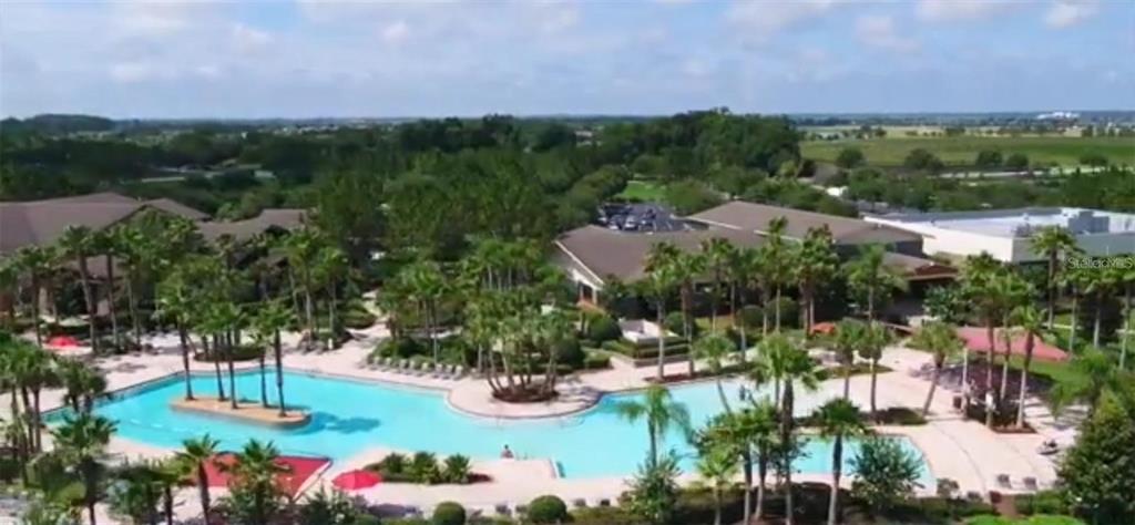 10041 Southwest 77th Loop Ocala, FL 34481 - Photo 31 of 39 a view of a lake with a mountain in the background