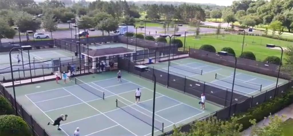 10041 Southwest 77th Loop Ocala, FL 34481 - Photo 35 of 39 a view of a tennis court