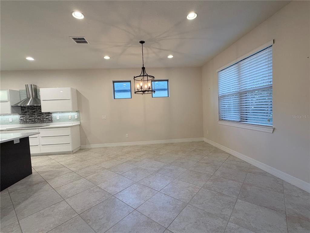 10041 Southwest 77th Loop Ocala, FL 34481 - Photo 5 of 39 a view of kitchen with stove