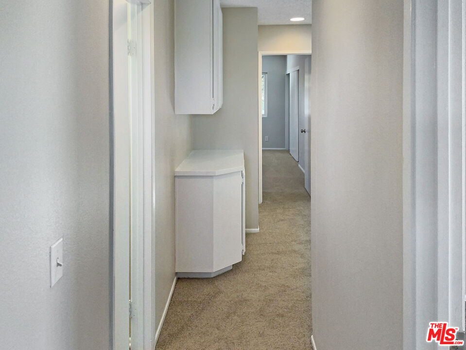 11074 Kenyon Way Rancho Cucamonga, CA 91701 - Photo 19 of 28 a view of hallway with shower and closet