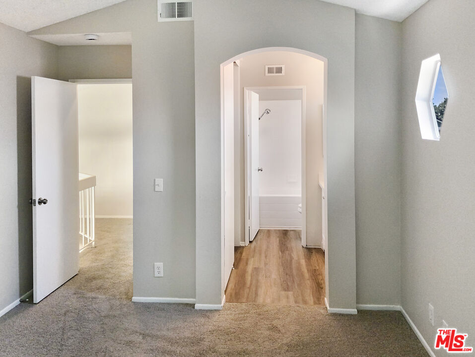 11074 Kenyon Way Rancho Cucamonga, CA 91701 - Photo 21 of 28 a view of a room with wooden floor