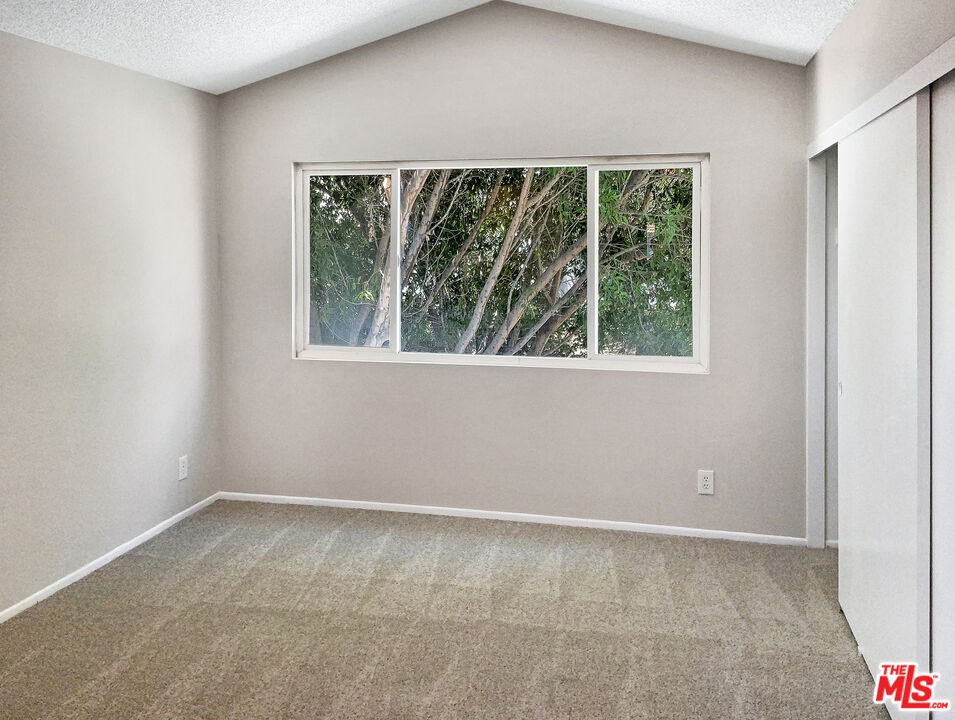 11074 Kenyon Way Rancho Cucamonga, CA 91701 - Photo 5 of 28 an empty room with a window