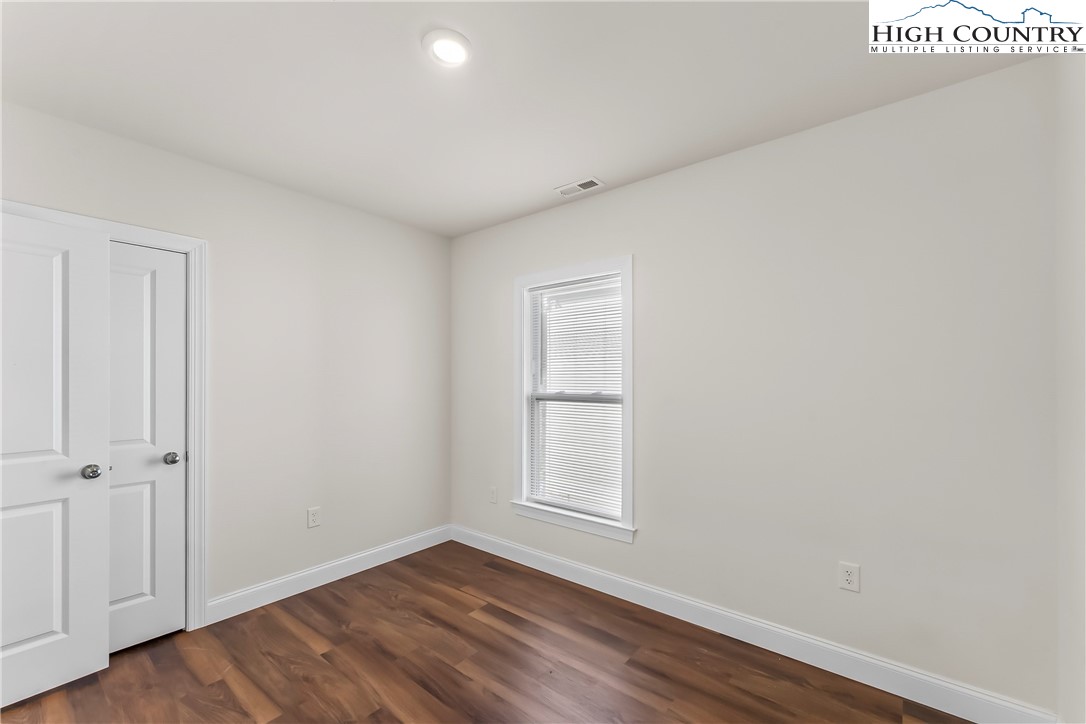 262 Old Bristol Road Boone, NC 28607 - Photo 27 of 38 a view of an empty room with wooden floor